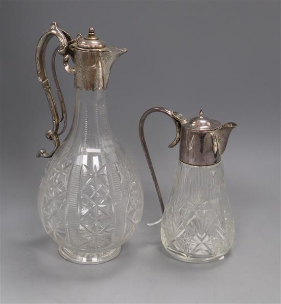 A George V silver mounted glass liqueur jug by Burton & Waters and a Victorian silver plate mounted cut glass claret jug.